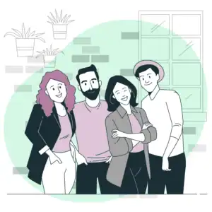 Groupe de 4 collègues qui prennent la pose et qui sourient